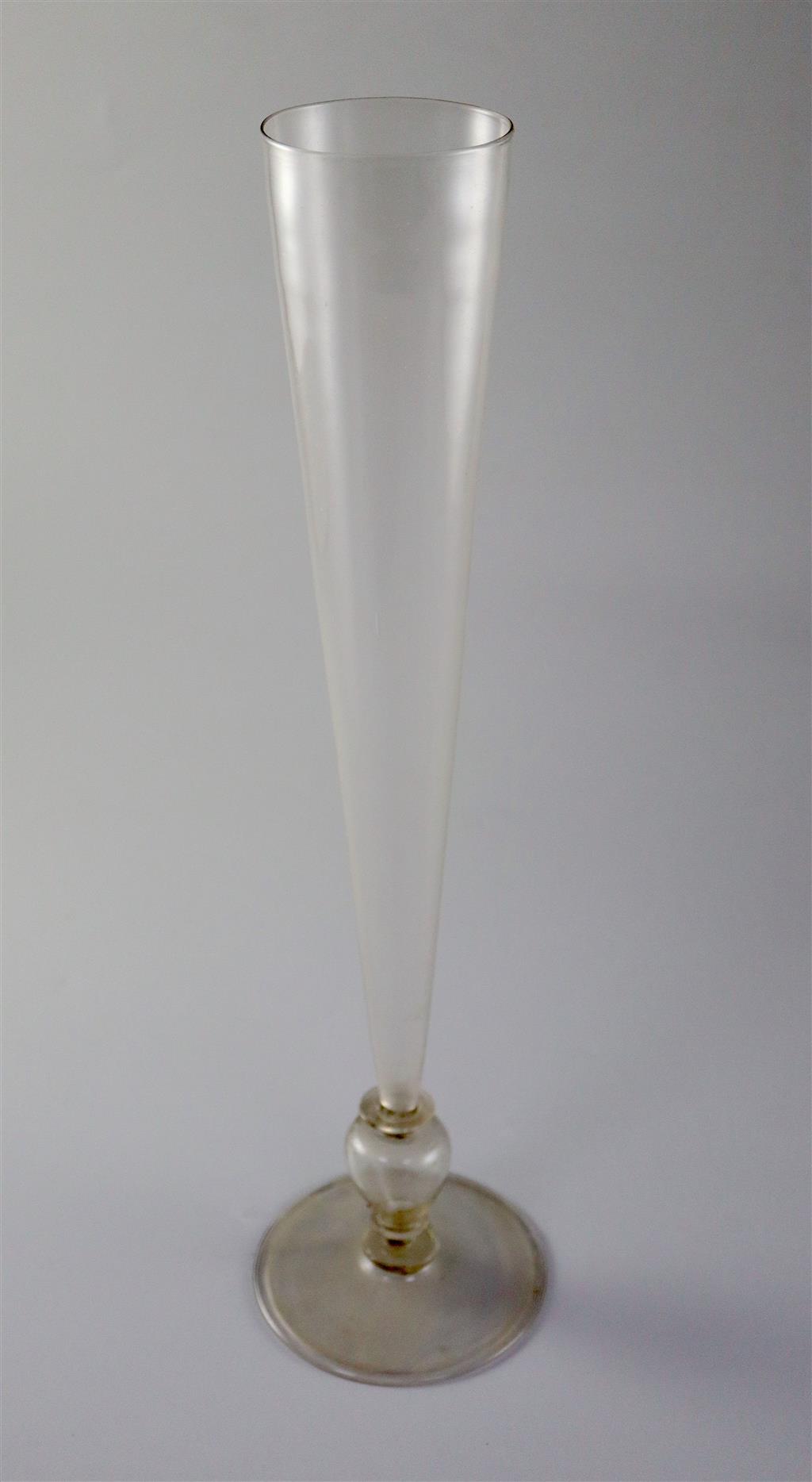 A tall Dutch glass flute, last quarter 17th century, 39cm high